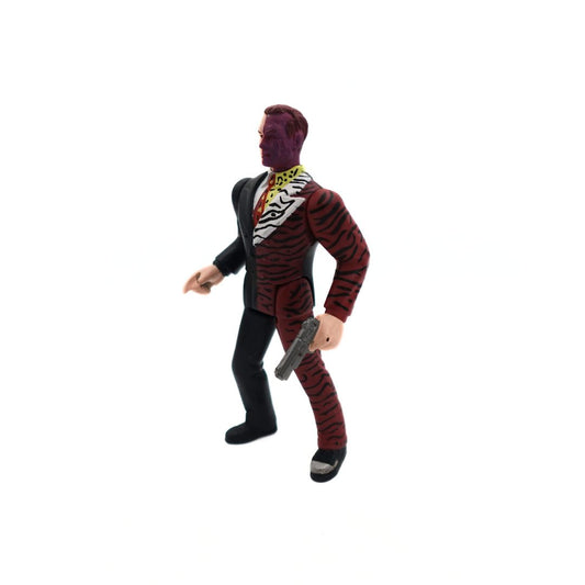 1995 Tommy Lee Jones Batman Forever Two-Face figurine with a half black suit and half zebra print suit