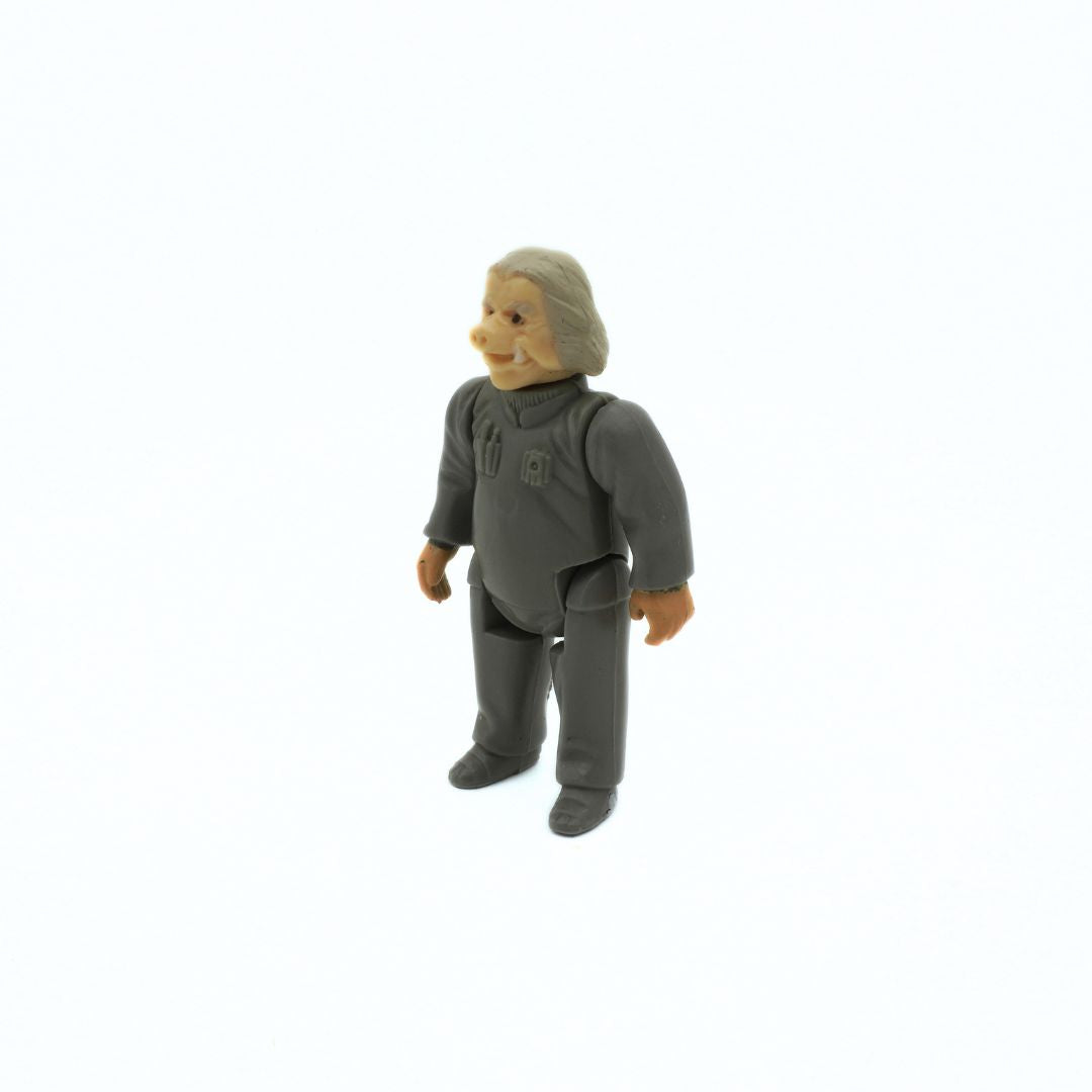 Toy figure of a person in a gray outfit on a white background