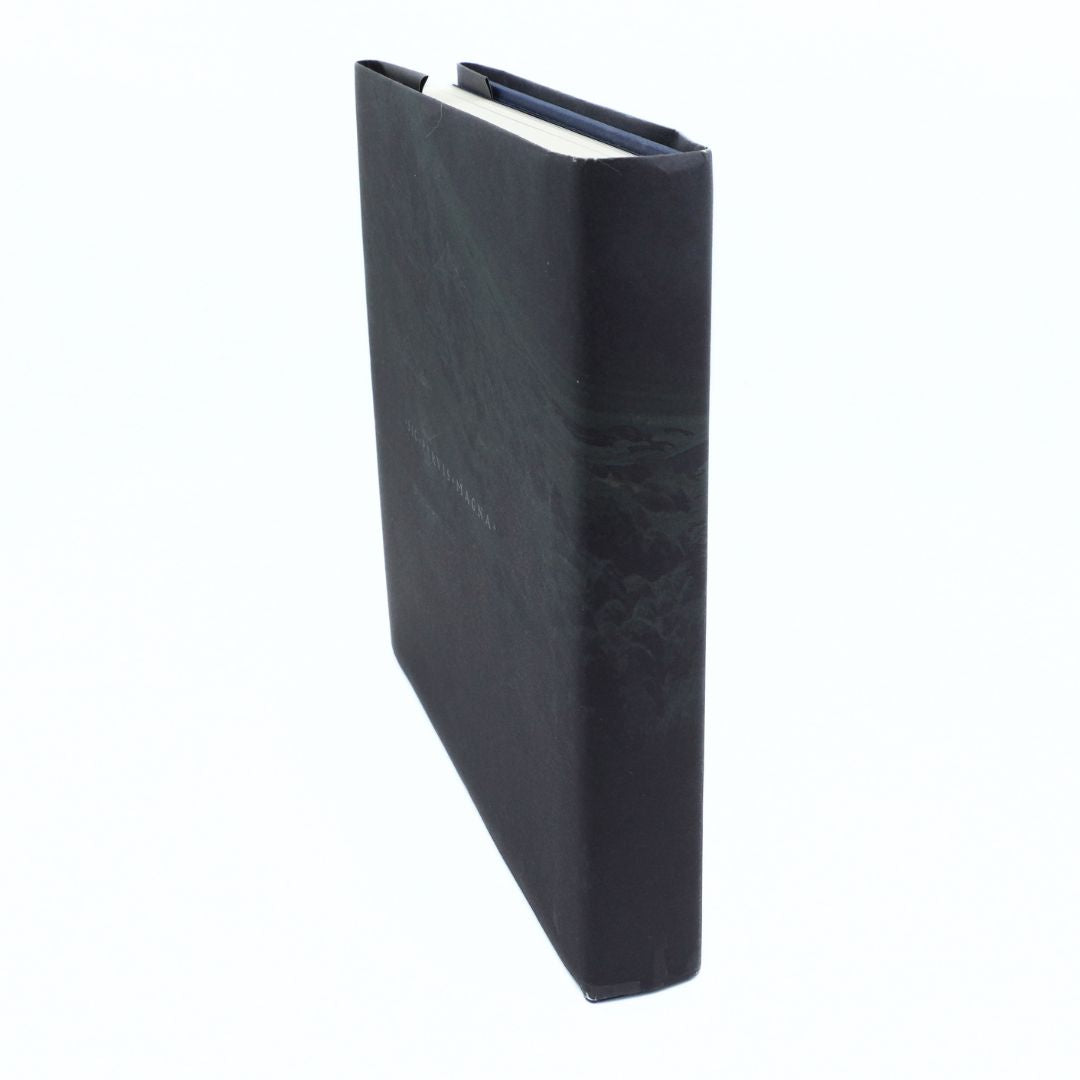 Black book with white pages on a white background