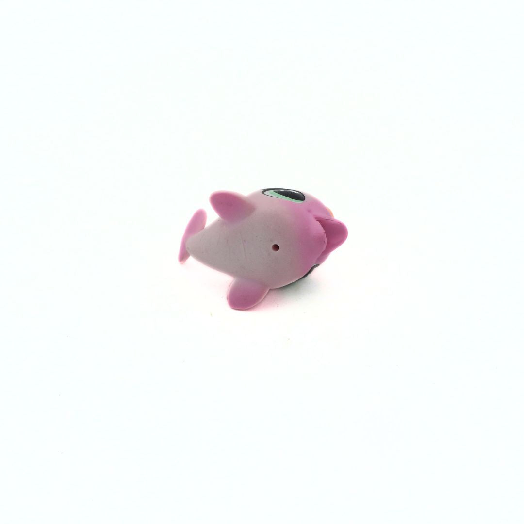 Pink cartoon-like figurine on a white background