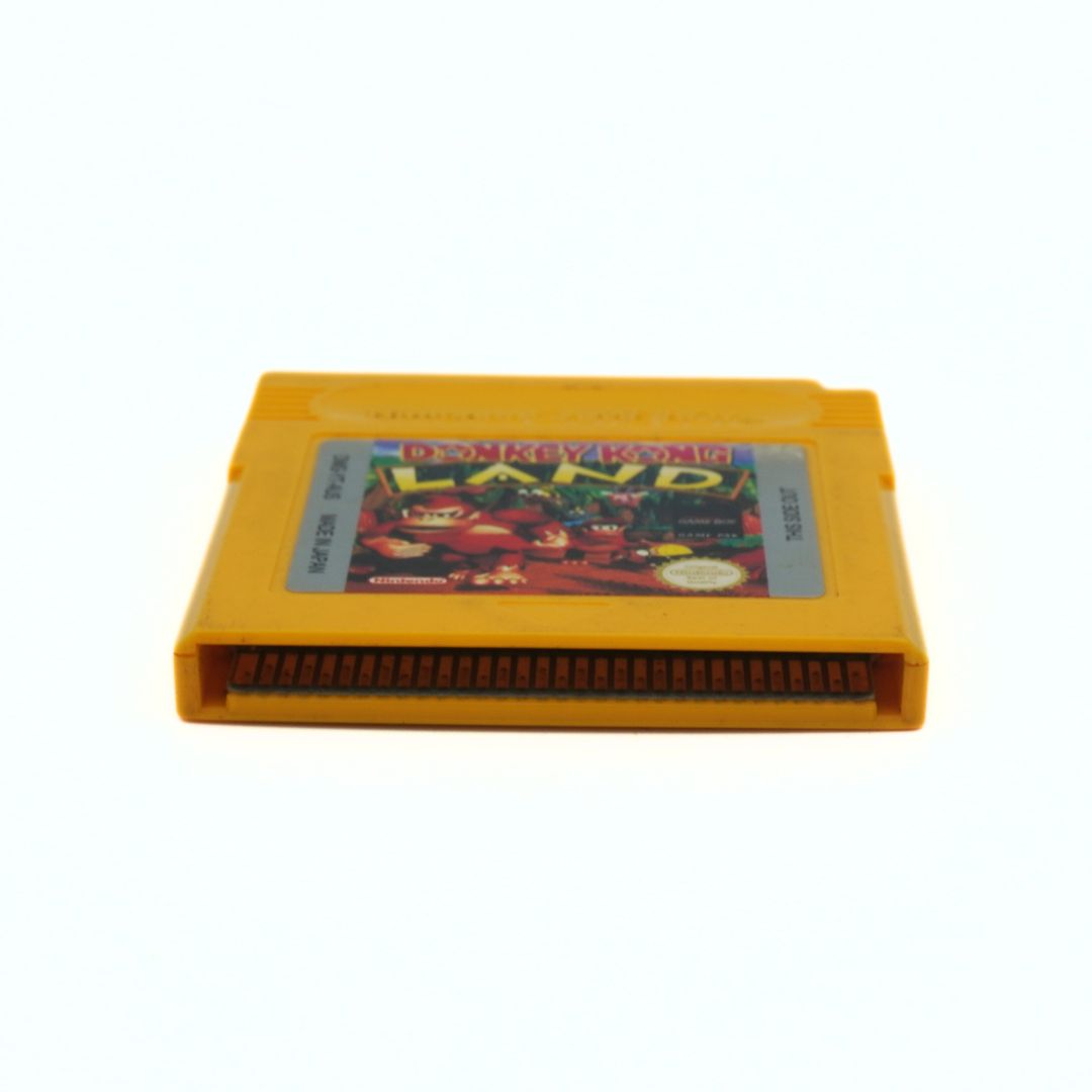 Yellow game cartridge with colorful label on a white background