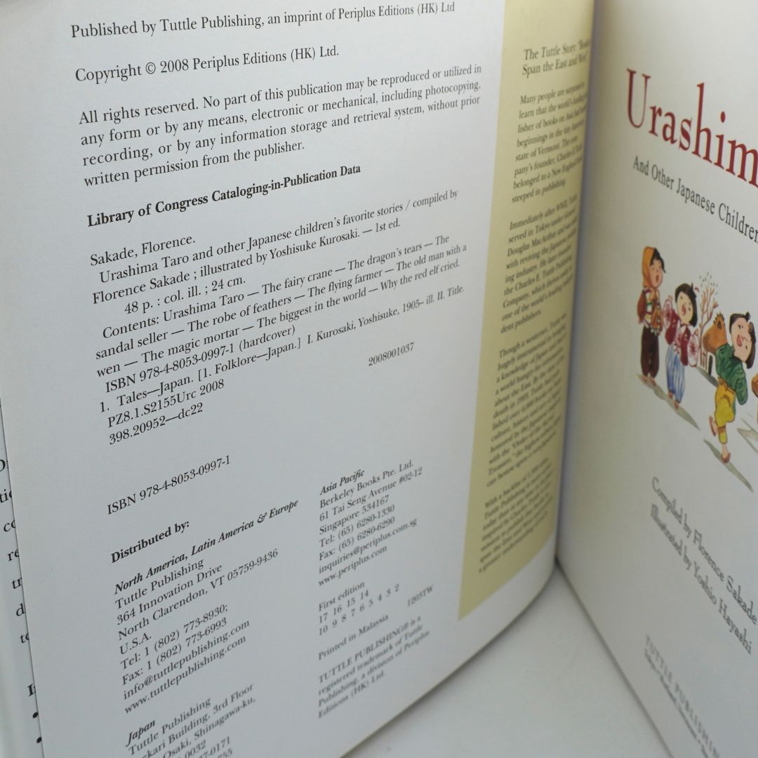 An open children's book showing the back cover and inner pages, with text including 'Library of Congress Cataloging-in-Publication Data' and the title 'Urashima And Other Japanese Children.'.