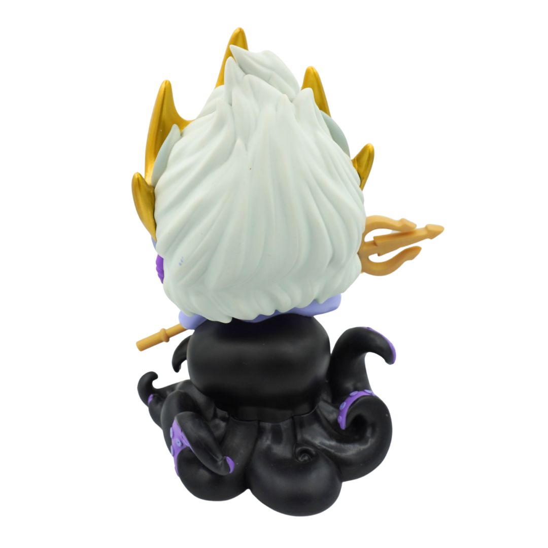 Jumbo sized purple Ursula figurine from the Little Mermaid with a gold crown and black dress