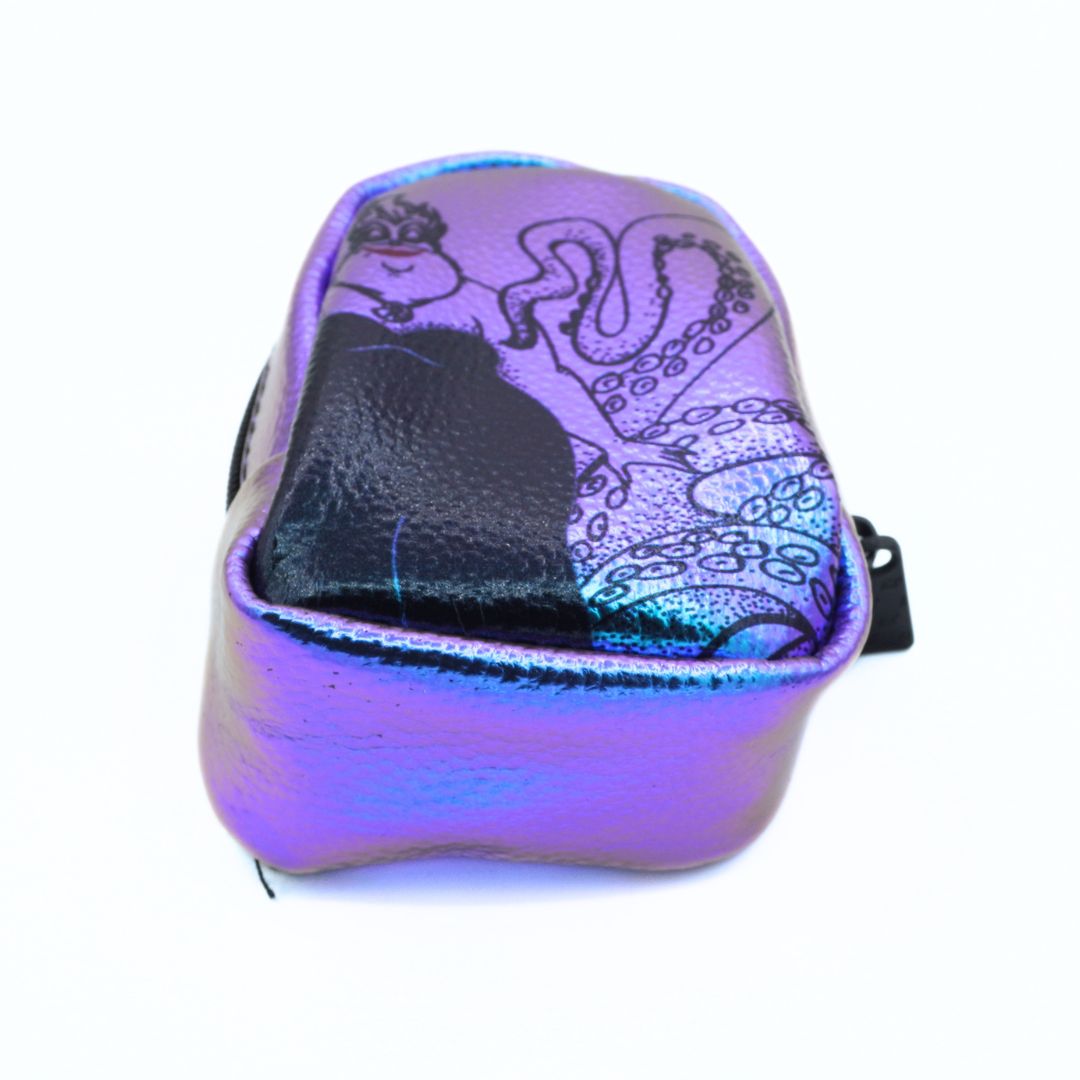 A small iridescent purple and blue pouch with a black octopus tentacle graphic, shown on a plain white background.