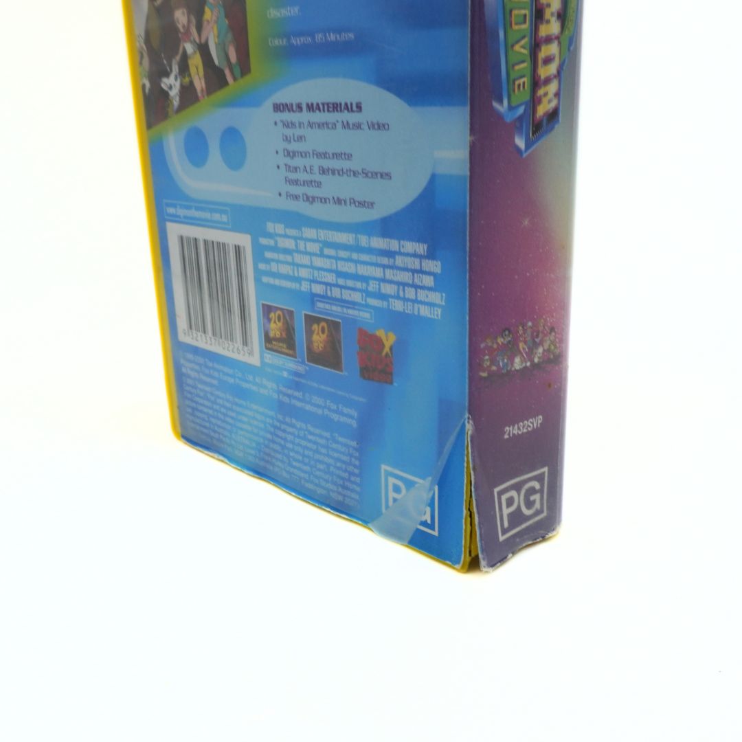 Back view of a colourful VHS case with text and a barcode on a white background