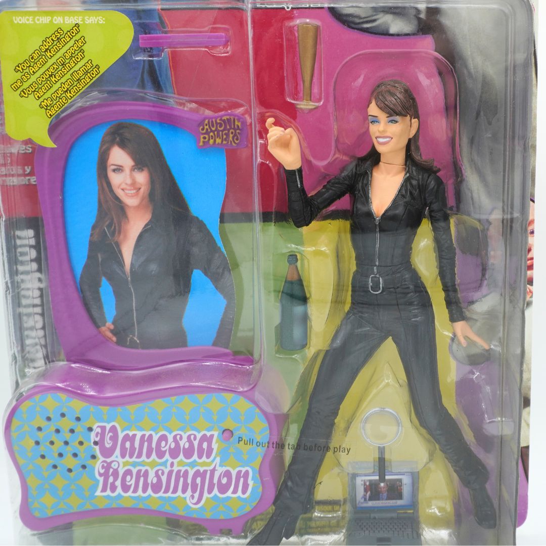 Toy figure of a character from 'Austin Powers' in packaging with a TV screen
