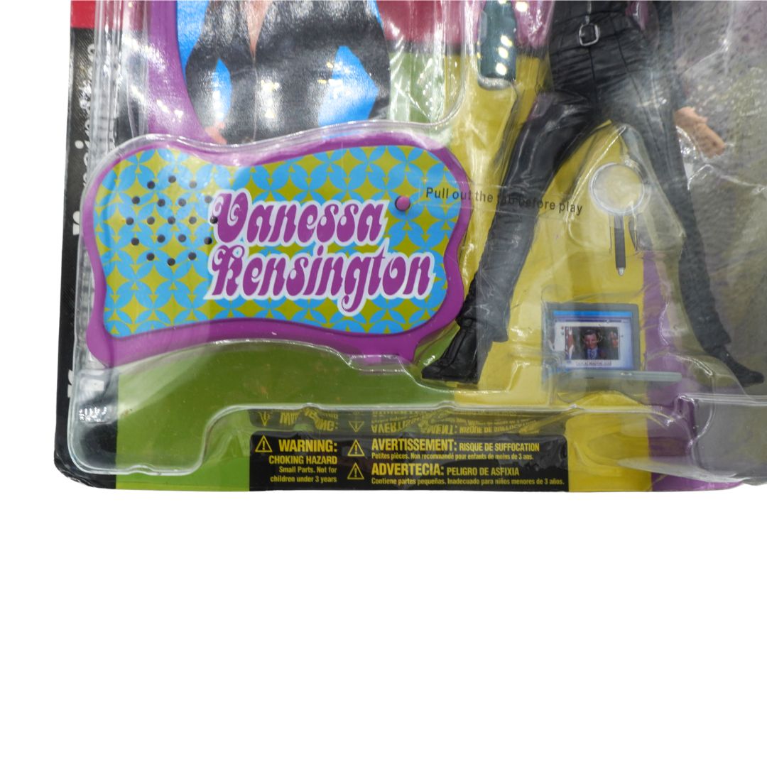 Toy figure in packaging with 'Vanessa Kensington' branding on a white background