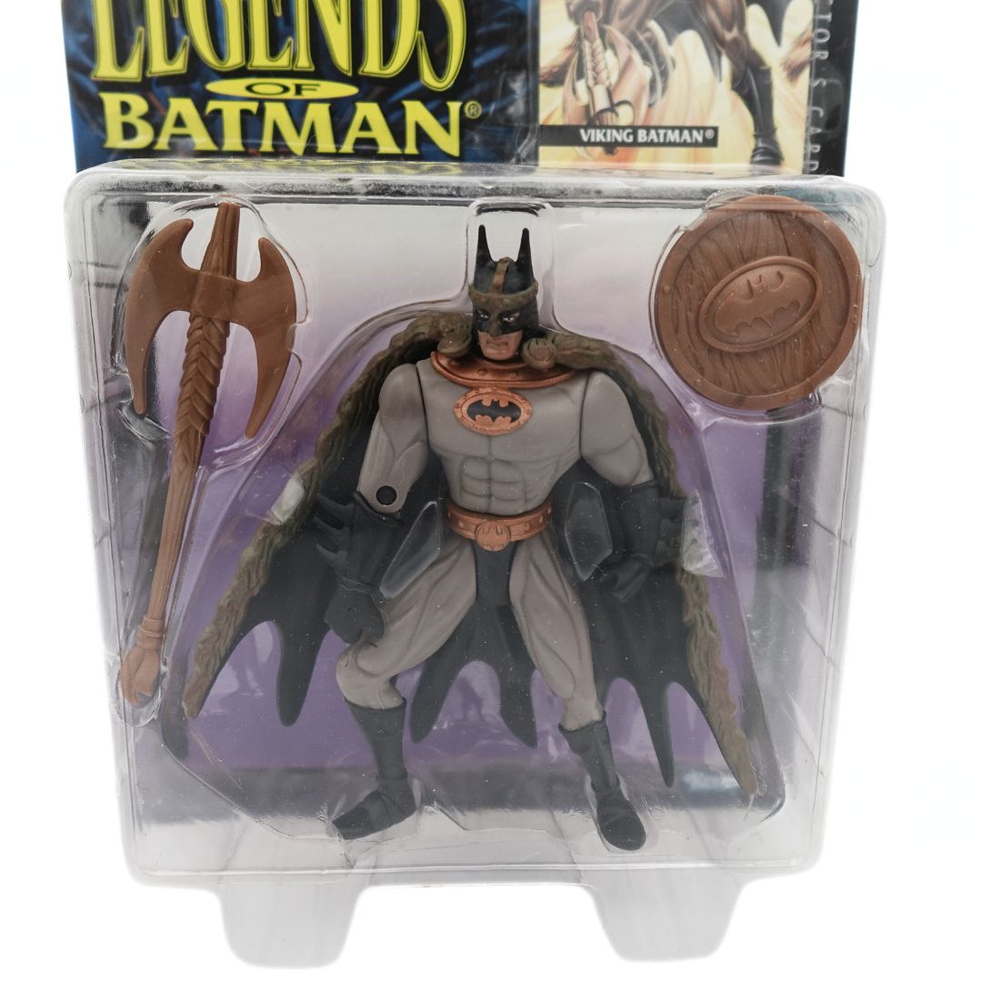 Closeup of the Viking Batman figure showing the costume, removable cape, wooden-look battle axe and shield