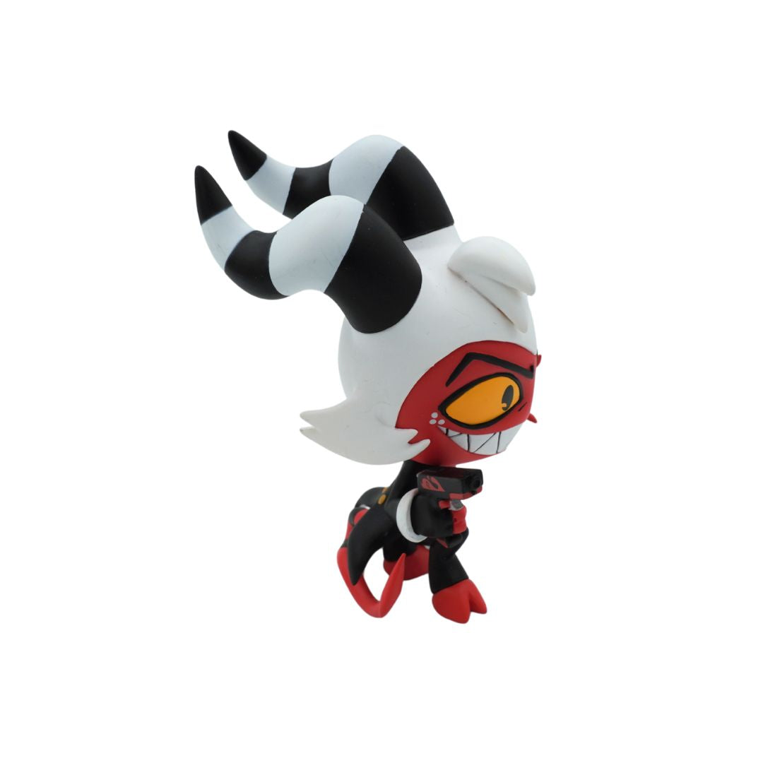 A small stylized character figurine or toy with a white body, black-and-white striped horns, a red eye area, yellow eye, and black-and-red limbs, shown on a plain white background.