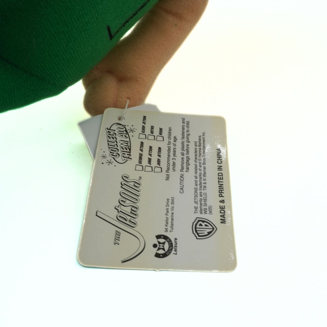 Close-up of a Warner Bros. tag on a product with a blurred background