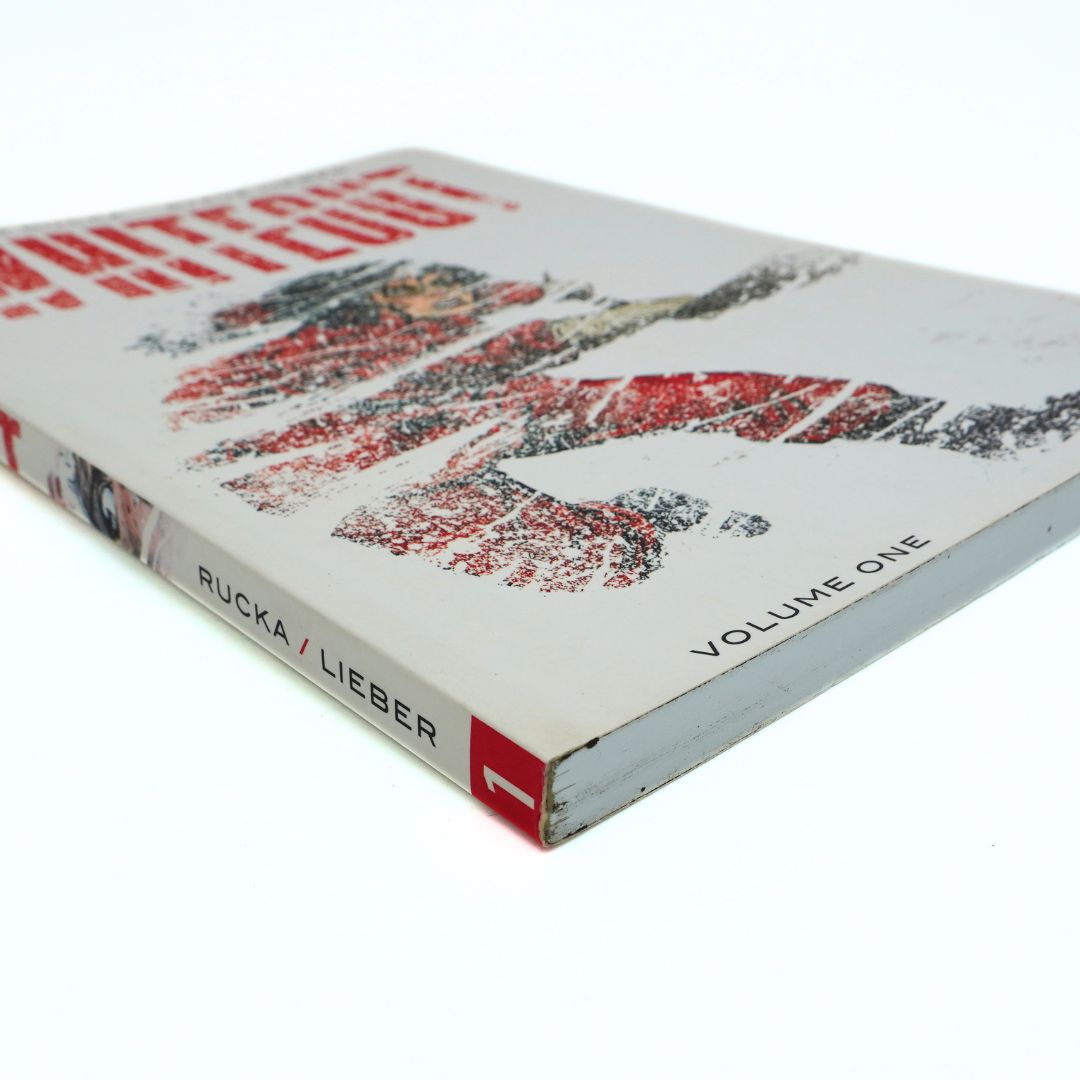 Corner of Whiteout Volume 1 with red details and a white backdrop