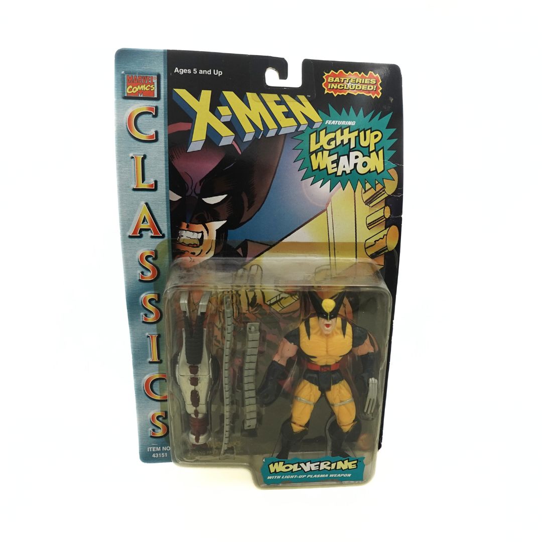 Front one photo of a 1996 Wolverine Classics figure in its packaging wearing his iconic yellow and black costume