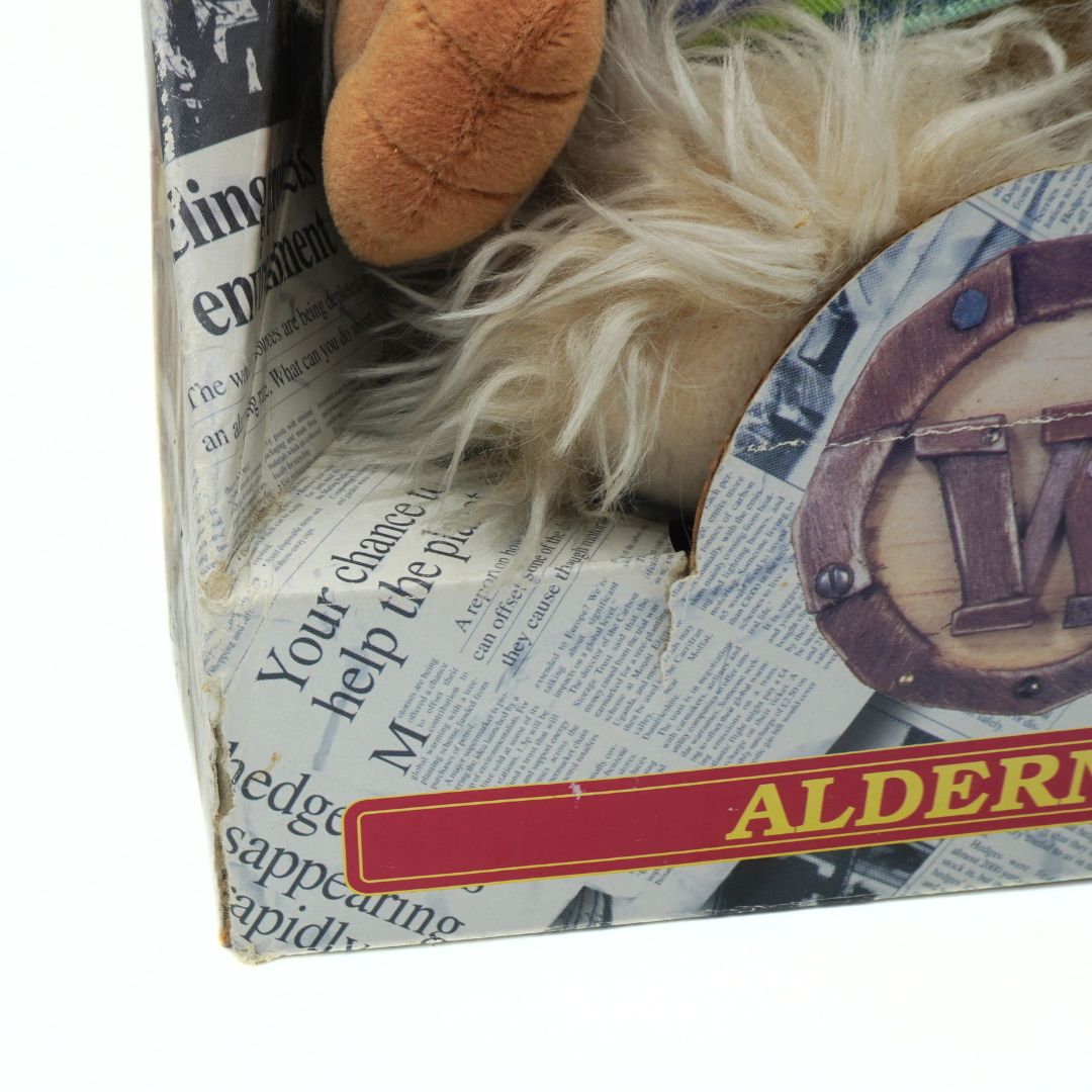 Bottom corner of a vintage Wombles toy showing some damage