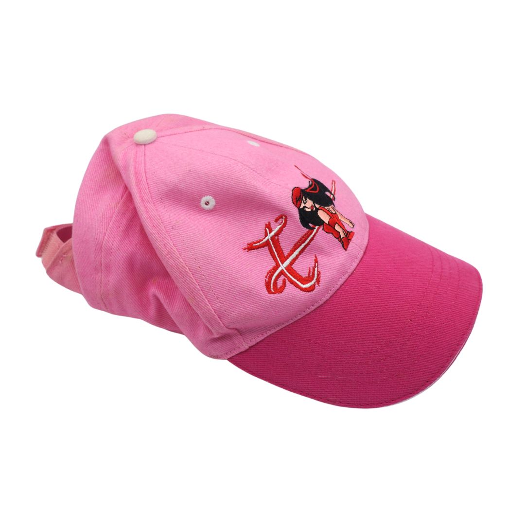 A pink baseball cap with a darker pink visor, featuring an embroidered pirate character and red anchor motif on the front.