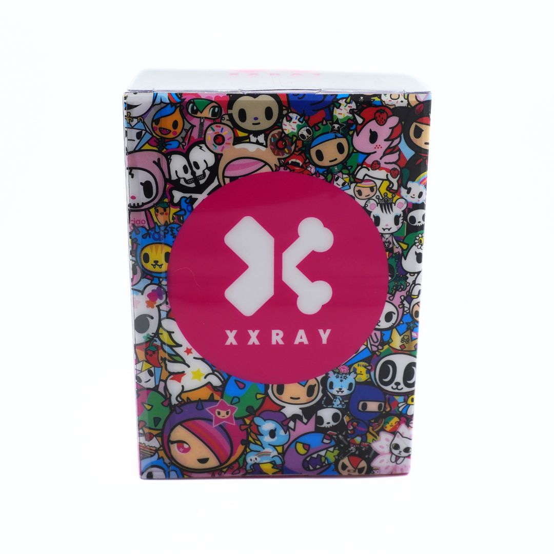 A rectangular product box featuring a colorful collage of cartoon characters and a large pink circle in the center with a white XXRAY logo.