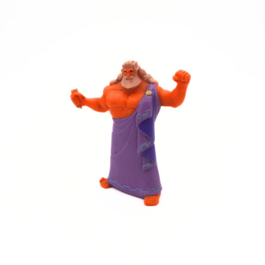 Toy figure of a character with orange skin and purple garment on a white background