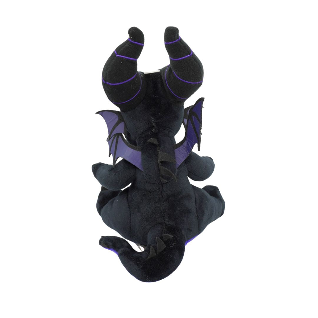 Black plush toy with purple accents on a white background