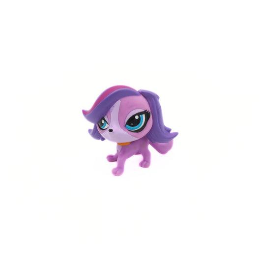 Small purple and pink toy figure on a white background