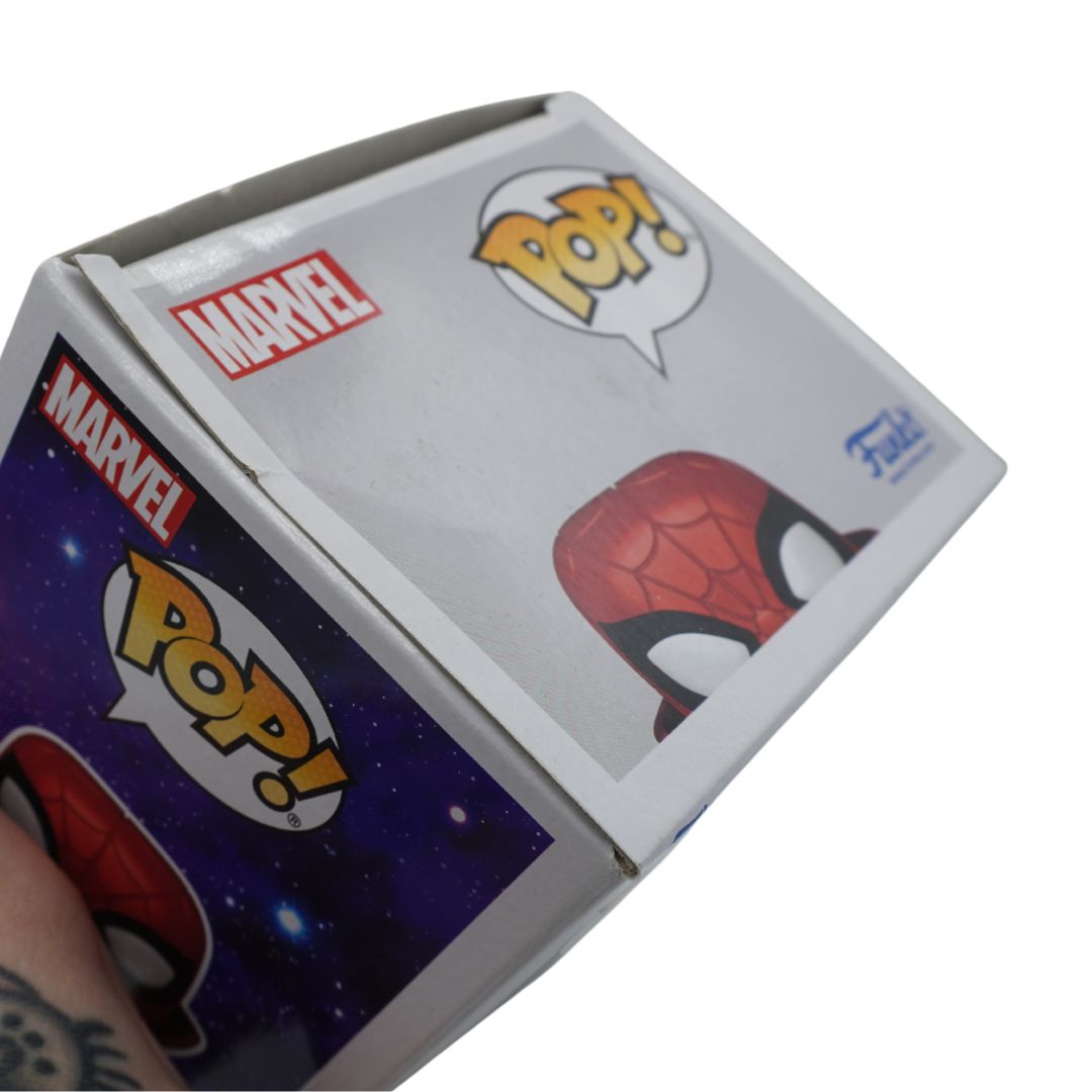 Marvel Pop! Spider-Man Funko Pop collectible figure box, showing the printed Spider-Man illustration and Marvel and Pop! branding on a white background.