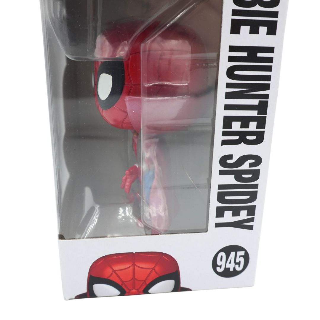 Spider-Man 945 'Zombie Hunter Spidey' collectible figure in its original window box packaging, featuring a red and blue Spider-Man figure visible through a clear plastic window on a white box with black text.