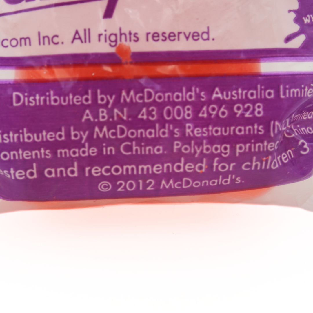 Back of a McDonald's product packaging with text and branding.